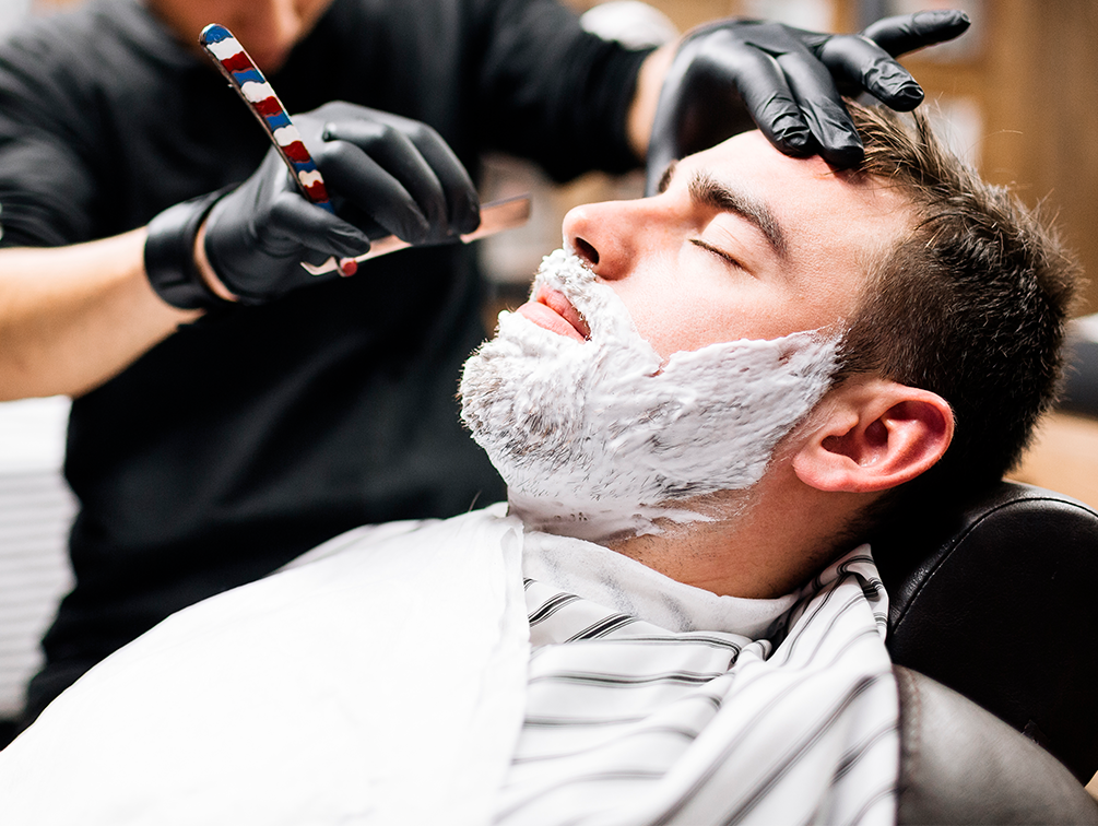 Man getting a hot shave